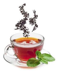 cup-of-tea-and-tea-leaves-isolated-on-a-white-background